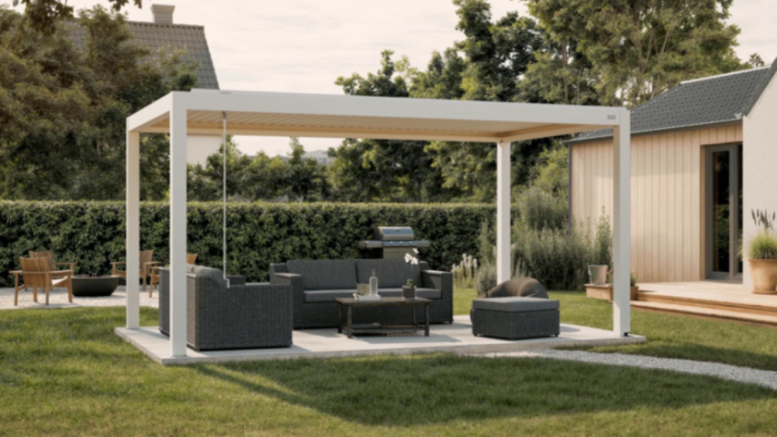 White Rinova aluminum louvered pergola over a backyard patio lounge in Southern California
